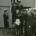 Margit Johnsen dekoreres for sin innsats under 2. verdenskrig. Kapteinen står til høyre for Margit, admiral Ritchie foretok dekoreringen. Til høyre for admiralen er den norske konsul i Liverpool, Johan Vogt, som foretok dekoreringen fra norsk side.